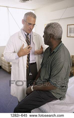 multiethnic, men, consultation, patient, doctor, medicine, explaining View Large Photo Image Stock Photography - multiethnic, men, consultation, patient, doctor, medicine, explaining. Fotosearch