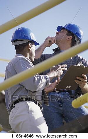 multiethnic, men, industry, construction, outdoors, industrial, contemplating View Large Photo Image Stock Photograph - multiethnic, men, industry, construction, outdoors, industrial, contemplating. Fotosearch