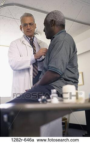 multiethnic, men, listening, patient, doctor, stethoscope, Middle-aged View Large Photo Image Stock Image - multiethnic, men, listening, patient, doctor, stethoscope, Middle-aged. Fotosearch