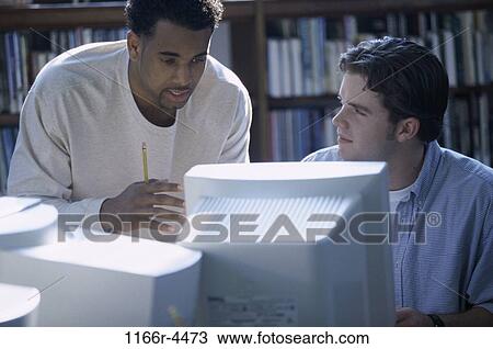 multiethnic, men, studying, library, computers, education, using View Large Photo Image Stock Image - multiethnic, men, studying, library, computers, education, using. Fotosearch