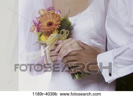 Stock Image - multiethnic, people, hands, bracelet, pearls, wedding. Fotosearch