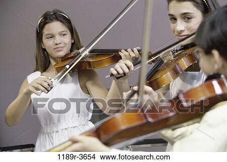 multiethnic, people, playing, children, play, instruments, talent View Large Photo Image Picture - multiethnic, people, playing, children, play, instruments, talent. Fotosearch