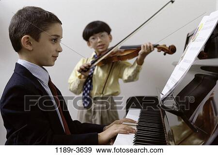 multiethnic, people, playing, piano, violin, children, play View Large Photo Image Stock Photo - multiethnic, people, playing, piano, violin, children, play. Fotosearch