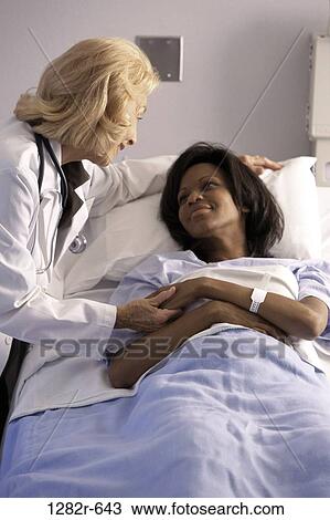 multiethnic, women, bed, calm, patient, doctor, medicine View Large Photo Image Stock Image - multiethnic, women, bed, calm, patient, doctor, medicine. Fotosearch