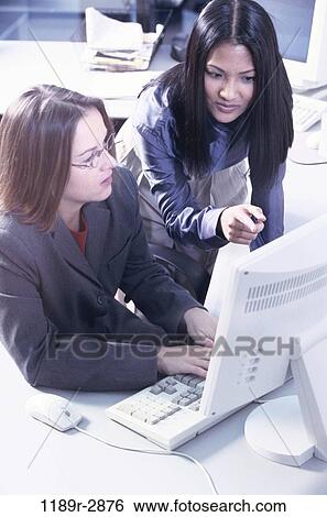 multiethnic, women, computer, business, using, casual, indoors View Large Photo Image Stock Photograph - multiethnic, women, computer, business, using, casual, indoors. Fotosearch