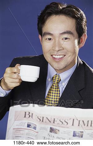 newspaper, Asian, coffee, reading, drinking, business View Large Photo Image Stock Image - newspaper, Asian, coffee, reading, drinking, business. Fotosearch