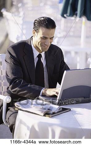 newspaper, Hispanic, computer, laptop, typing, business View Large Photo Image Stock Image - newspaper, Hispanic, computer, laptop, typing, business. Fotosearch
