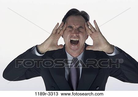 Stock Image - pain, business, angry, frustrated, Middle-aged, yelling, anger. Fotosearch