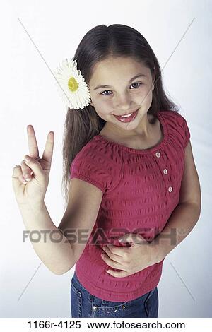 peace, people, girl, flower, gesturing, child, brunette View Large Photo Image Stock Photography - peace, people, girl, flower, gesturing, child, brunette. Fotosearch