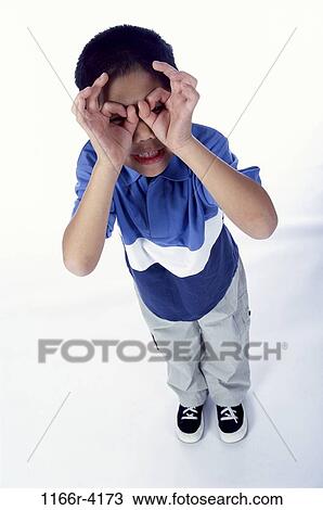 Stock Image - people, Asian, boy, child, funny, humor, indoors. Fotosearch