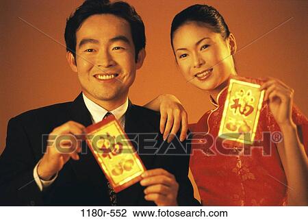 people, Asian, couple, holding, new years, hold, indoors View Large Photo Image Stock Image - people, Asian, couple, holding, new years, hold, indoors. Fotosearch