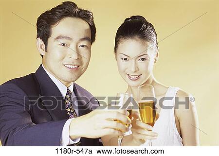 people, Asian, couple, toasting, wine, drinking, toast View Large Photo Image Stock Image - people, Asian, couple, toasting, wine, drinking, toast. Fotosearch