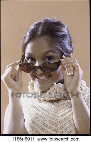 people, Asian, Indian, sunglasses, posing, turtleneck, brunette View Large Photo Image Stock Image - people, Asian, Indian, sunglasses, posing, turtleneck, brunette. Fotosearch