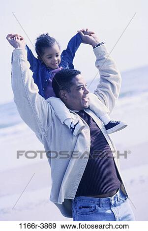 people, beach, carrying, family, father, daughter, shoulders View Large Photo Image Stock Photo - people, beach, carrying, family, father, daughter, shoulders. Fotosearch