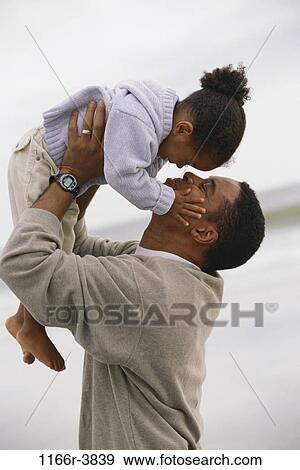 people, beach, holding, lifting, family, affection, father View Large Photo Image Stock Photo - people, beach, holding, lifting, family, affection, father. Fotosearch