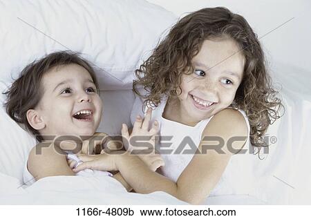 people, bed, children, tickling, brunette, indoors View Large Photo Image Stock Image - people, bed, children, tickling, brunette, indoors. Fotosearch
