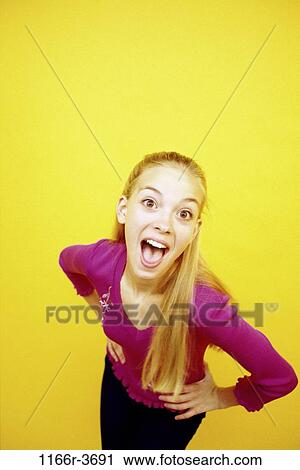 Stock Image - people, blond, screaming, indoors, scream, teenager. Fotosearch
