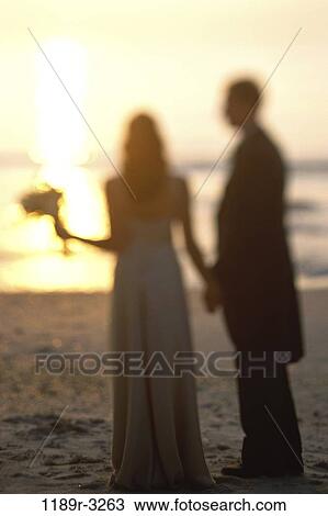 people, blur, couple, sunset, beach, romantic, wedding View Large Photo Image Stock Image - people, blur, couple, sunset, beach, romantic, wedding. Fotosearch