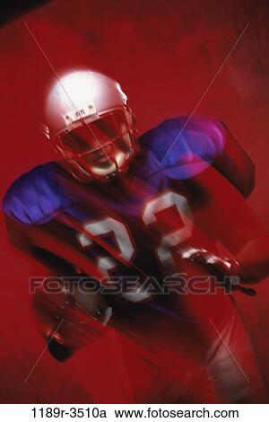 Stock Image - people, blur, running, playing, football, motion. Fotosearch