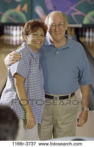 Stock Photo - people, bowl, hugging, family, hug, father, daughter. Fotosearch
