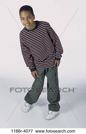 Stock Photo - people, boy, child, posing, indoors, pose, African-American. Fotosearch