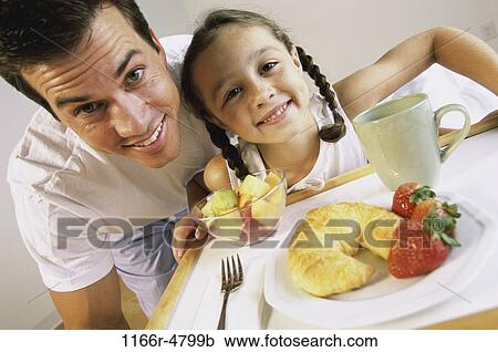 people, breakfast, bed, family, father, daughter View Large Photo Image Stock Image - people, breakfast, bed, family, father, daughter. Fotosearch