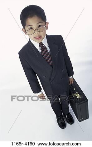 people, briefcase, suit, Asian, eyeglasses, boy, costume View Large Photo Image Stock Image - people, briefcase, suit, Asian, eyeglasses, boy, costume. Fotosearch