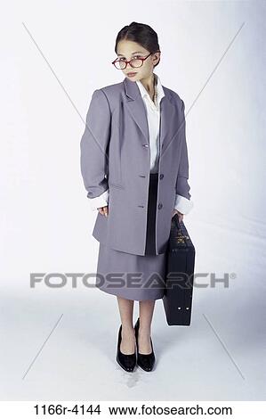 Picture - people, briefcase, suit, eyeglasses, Hispanic, girl, costume. Fotosearch