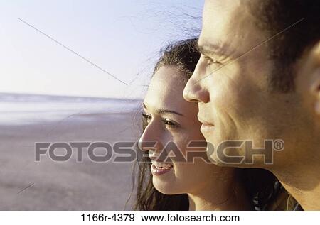 people, couple, beach, brunette, headshot, Caucasian, young adult View Large Photo Image Stock Photo - people, couple, beach, brunette, headshot, Caucasian, young adult. Fotosearch