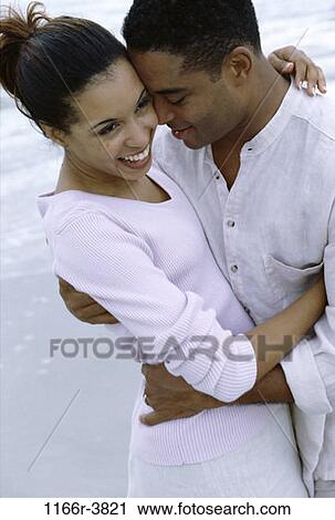 people, couple, beach, hugging, embracing, embrace, hug View Large Photo Image Stock Image - people, couple, beach, hugging, embracing, embrace, hug. Fotosearch