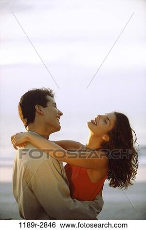 people, couple, beach, romantic, hugging, romance, hug View Large Photo Image Stock Photograph - people, couple, beach, romantic, hugging, romance, hug. Fotosearch