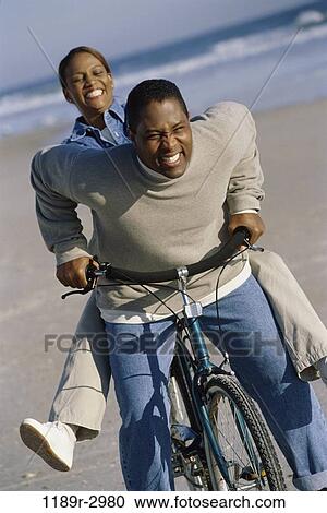 people, couple, bicycle, beach, riding, Middle-aged, bike View Large Photo Image Stock Image - people, couple, bicycle, beach, riding, Middle-aged, bike. Fotosearch