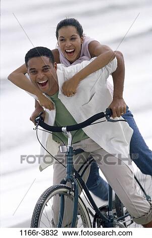 people, couple, bicycle, riding, outdoors, bike, cycling View Large Photo Image Stock Image - people, couple, bicycle, riding, outdoors, bike, cycling. Fotosearch