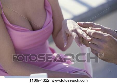people, couple, commitment, ring, romance, engagement, Caucasian View Large Photo Image Stock Image - people, couple, commitment, ring, romance, engagement, Caucasian. Fotosearch