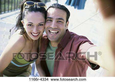 people, couple, Hispanic, outdoors, posing, brunette, Caucasian View Large Photo Image Picture - people, couple, Hispanic, outdoors, posing, brunette, Caucasian. Fotosearch