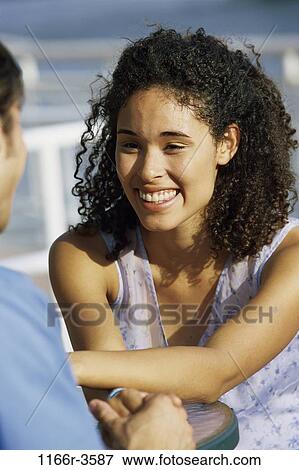 people, couple, Hispanic, outdoors, romance, brunette, young adult View Large Photo Image Stock Photo - people, couple, Hispanic, outdoors, romance, brunette, young adult. Fotosearch