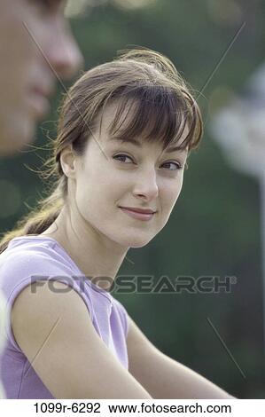 people, couple, outdoors, brunette, headshot, Caucasian, young adult View Large Photo Image Stock Image - people, couple, outdoors, brunette, headshot, Caucasian, young adult. Fotosearch