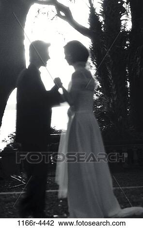 people, couple, outdoors, commitment, wedding, bride, groom View Large Photo Image Stock Image - people, couple, outdoors, commitment, wedding, bride, groom. Fotosearch