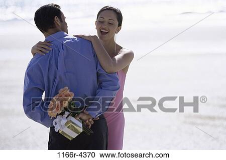 people, couple, outdoors, romantic, surprise, anticipation, gift View Large Photo Image Stock Image - people, couple, outdoors, romantic, surprise, anticipation, gift. Fotosearch