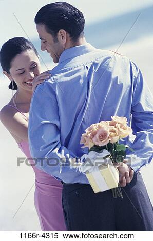 people, couple, outdoors, romantic, gifts, surprise, anticipation View Large Photo Image Stock Photography - people, couple, outdoors, romantic, gifts, surprise, anticipation. Fotosearch
