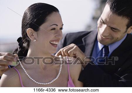 people, couple, pearls, outdoors, romantic, necklace, joyous View Large Photo Image Stock Photograph - people, couple, pearls, outdoors, romantic, necklace, joyous. Fotosearch