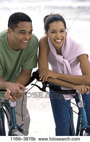 people, couple, riding, outdoors, bicycles, cycling, ride View Large Photo Image Stock Image - people, couple, riding, outdoors, bicycles, cycling, ride. Fotosearch