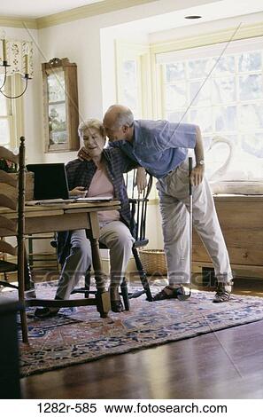 people, couple, senior, computer, laptop, planning, golf club View Large Photo Image Stock Photography - people, couple, senior, computer, laptop, planning, golf club. Fotosearch