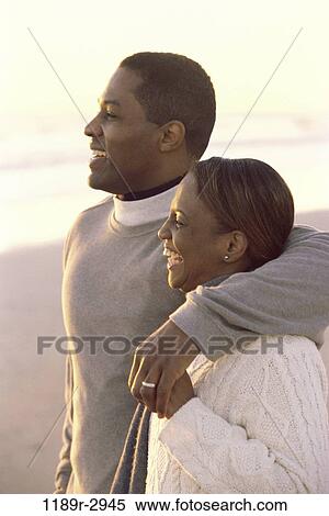 people, couple, watch, sunset, beach, watching, sunrise View Large Photo Image Stock Photography - people, couple, watch, sunset, beach, watching, sunrise. Fotosearch