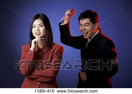 people, coworkers, Asian, knife, back, business, violence View Large Photo Image Stock Image - people, coworkers, Asian, knife, back, business, violence. Fotosearch
