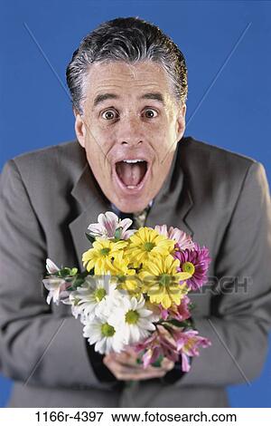 people, daisies, flowers, Middle-aged, surprise, gift View Large Photo Image Stock Photo - people, daisies, flowers, Middle-aged, surprise, gift. Fotosearch