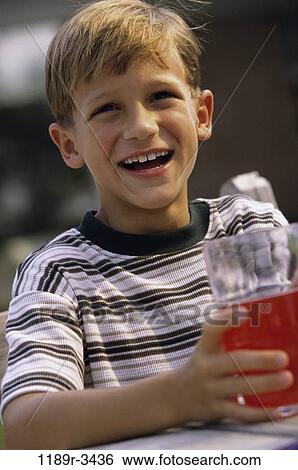 people, drinking, boy, outdoors, child, juice, brunette View Large Photo Image Stock Photograph - people, drinking, boy, outdoors, child, juice, brunette. Fotosearch