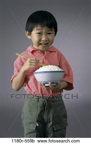 people, eating, Asian, chopsticks, boy, child, rice View Large Photo Image Stock Image - people, eating, Asian, chopsticks, boy, child, rice. Fotosearch