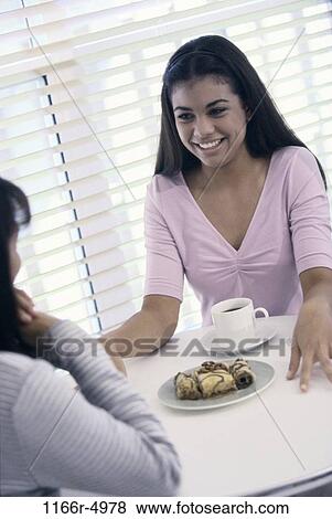 Stock Photo - people, eating, blinds, coffee, Hispanic, drinking, food. Fotosearch