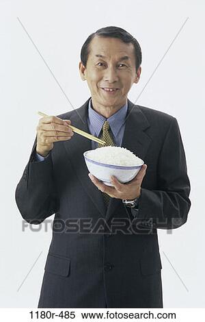people, eating, suit, Asian, chopsticks, bowl View Large Photo Image Stock Photography - people, eating, suit, Asian, chopsticks, bowl. Fotosearch